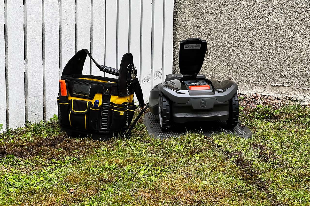 Felsökning av robotgräsklippare i en trädgård